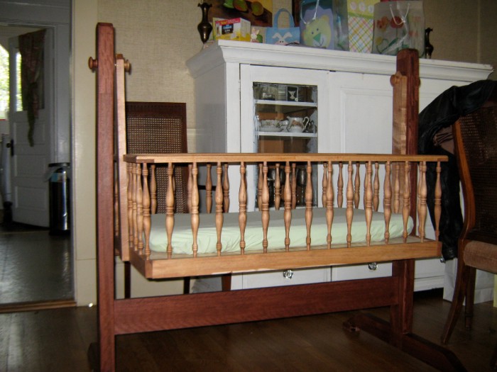 photo of a maple baby cradle 