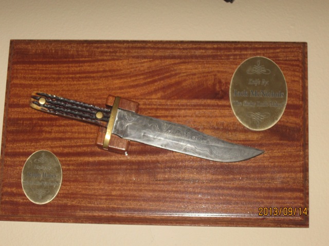 photo of plaque with knife