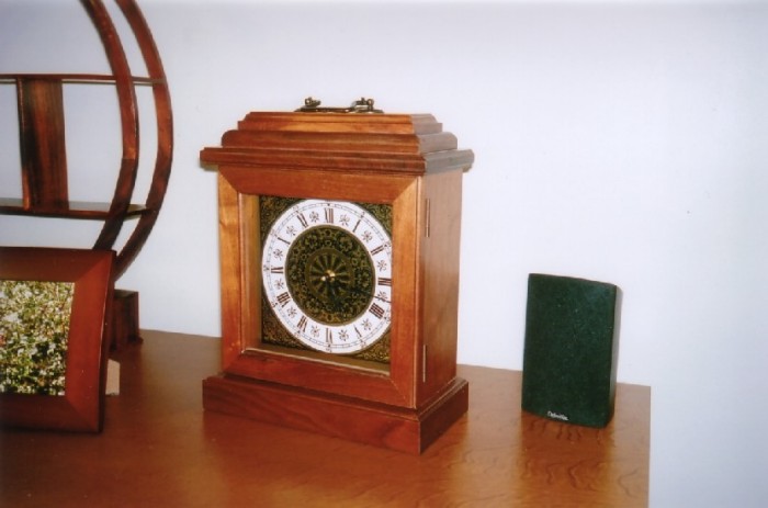 photo of a mantel clock sitting on a table