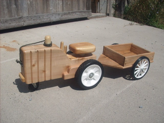 photo of a toy tractor and trailer